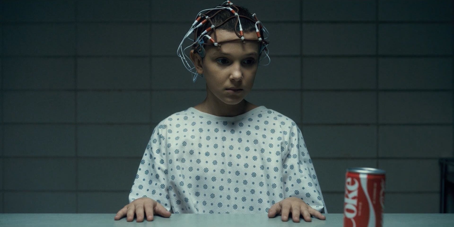 Millie-Bobbie-Brown-as-Eleven-Wired-Up-at-Hawkins-Lab-in-Stranger-Things
